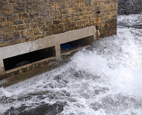 Needle valve in dam for base drainage